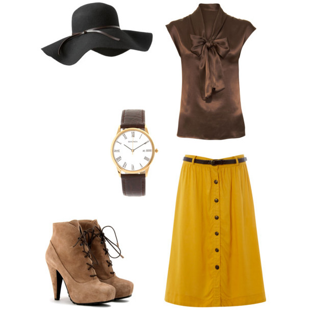 combinar tendencias de temporada: sombrero de fieltro en look con falda midi